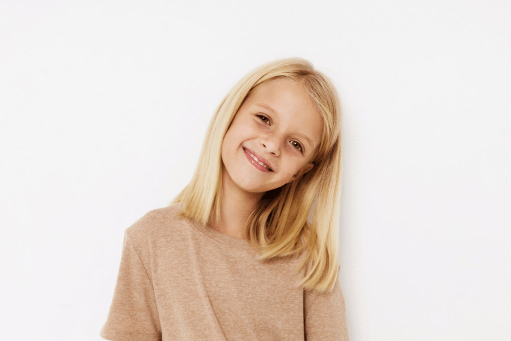 Child smiling before a Phase 1 orthodontic evaluation in Glen Allen, VA